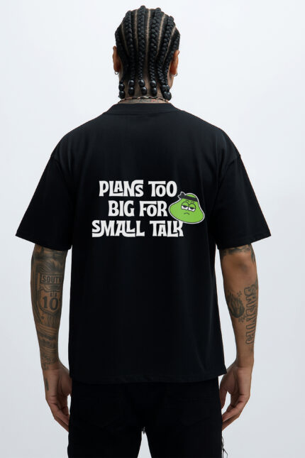 Hustle Black T-Shirt – Back view featuring “Plans Too Big For Small Talk” slogan and green RahRaha character graphic