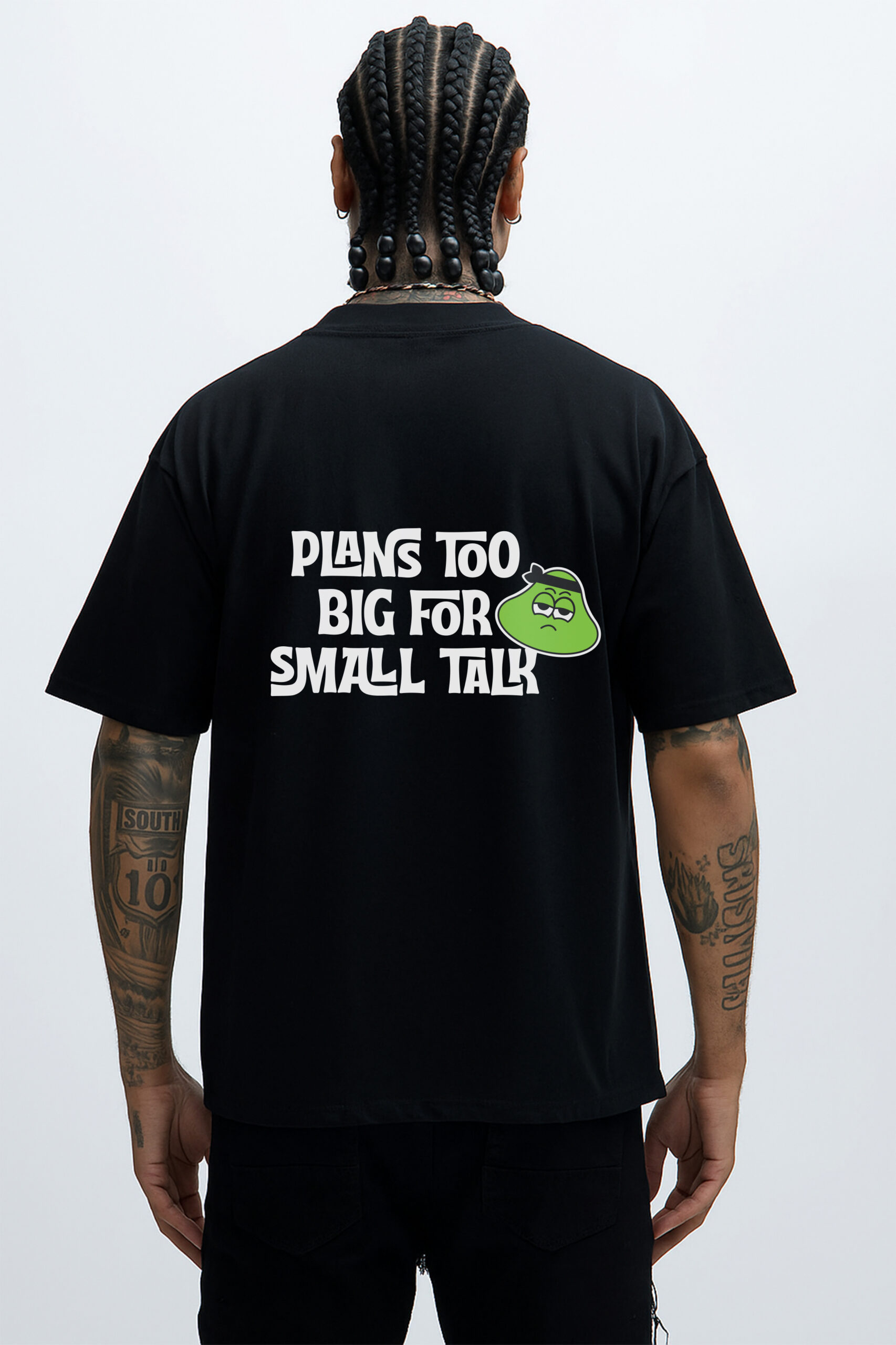 mens-black-oversized-male-tshirt-hustle-back-uae.jpg Hustle Black T-Shirt – Back view featuring “Plans Too Big For Small Talk” slogan and green RahRaha character graphic