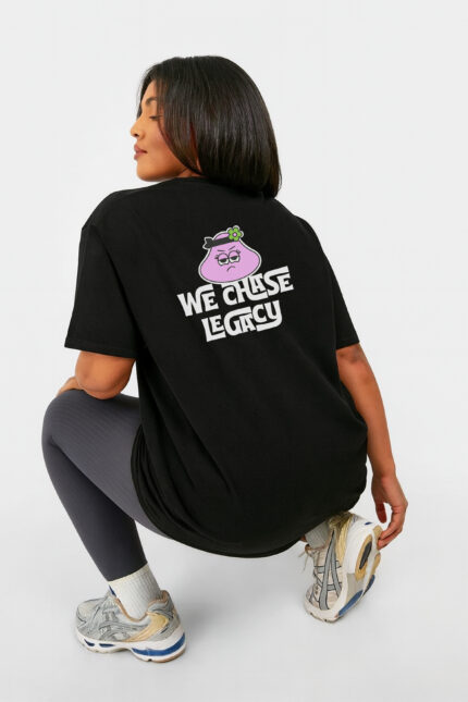 RahRaha Hustle Black T-Shirt – Seated pose showcasing slogan design and urban fit