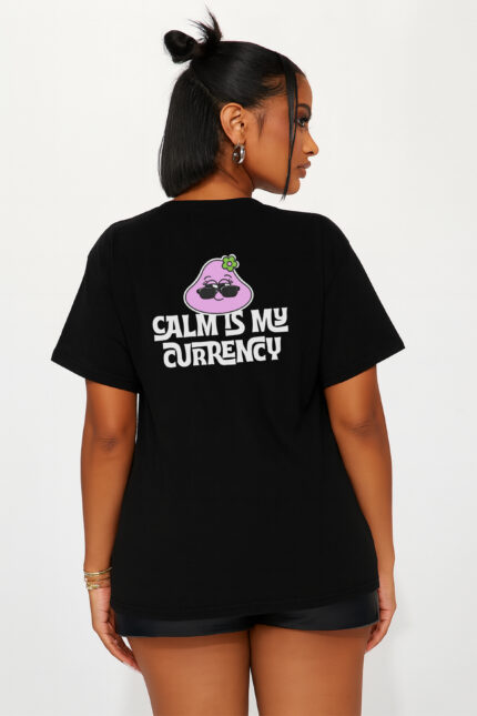 RahRaha Urban Chill Women’s Black Oversized T-Shirt – Back view featuring “Calm Is My Currency” slogan and pink RahRaha character